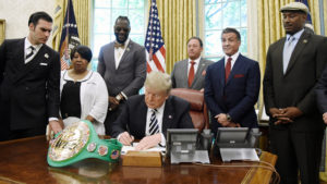 President Trump Signing Pardon (https://www.clickondetroit.com/news/politics/trump-pardons-boxer-jack-johnson)