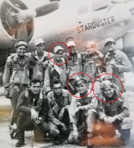 Flight crew in front of B-17 named Starduster