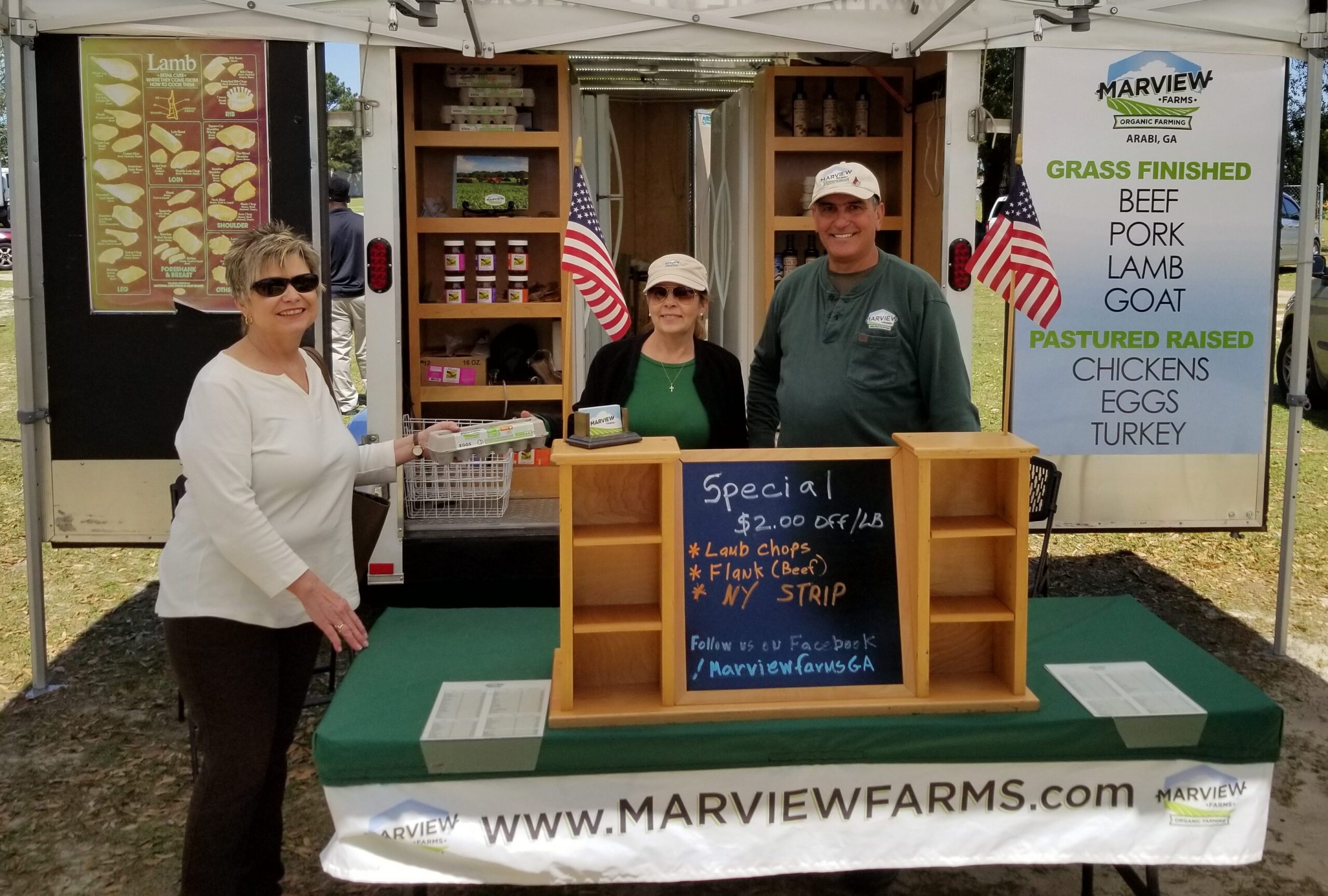 Woman buying eggs from Marview Farms